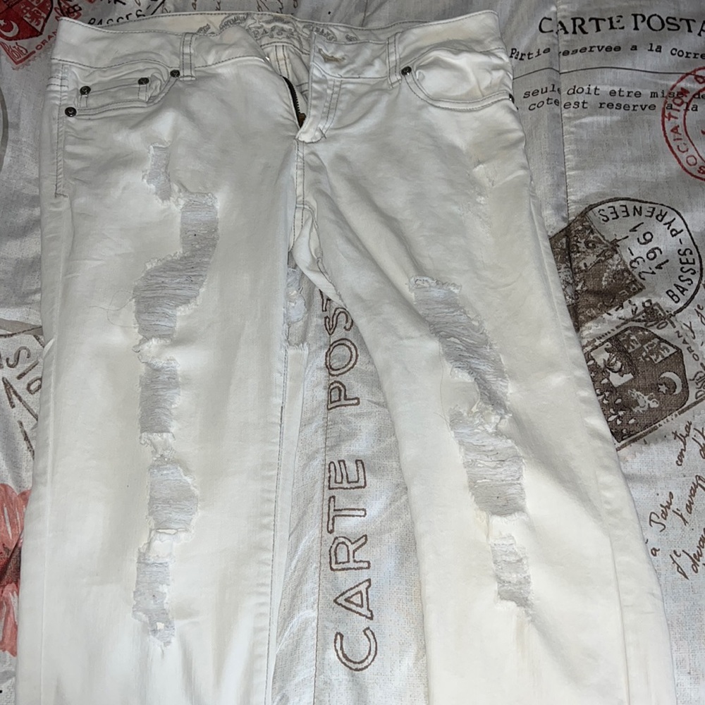 White cut up pants